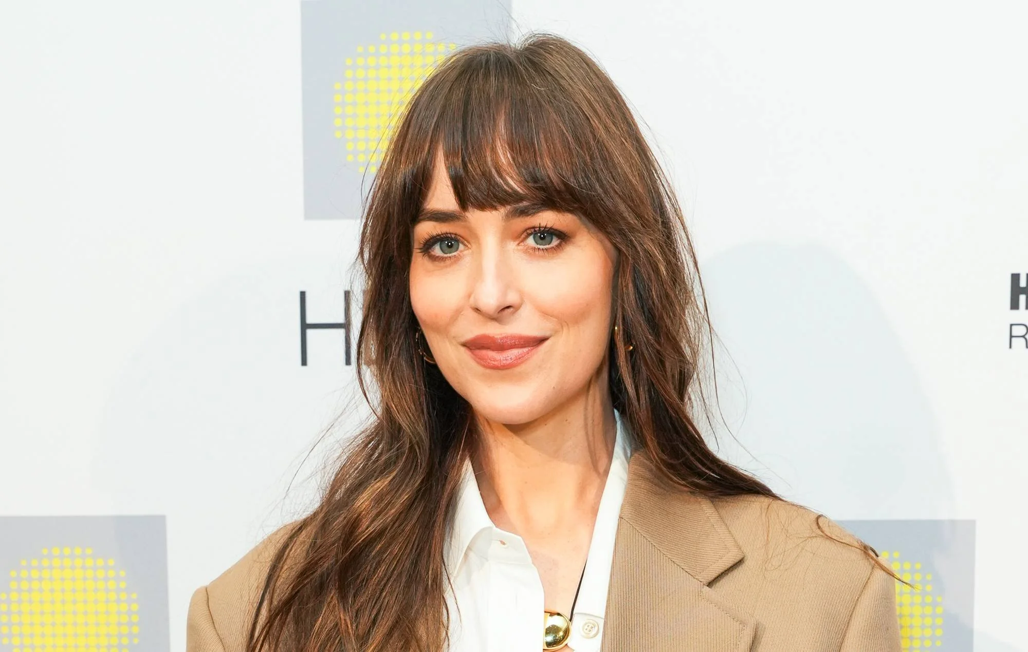 Dakota Johnson Sparks Breakup Rumors After Appearing Without Engagement Ring—What’s Going On With Chris Martin?