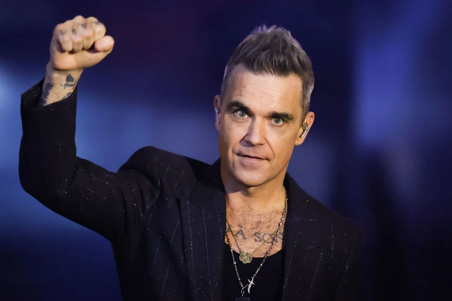 100+ Robbie Williams Lyrics for Pop Iconography--