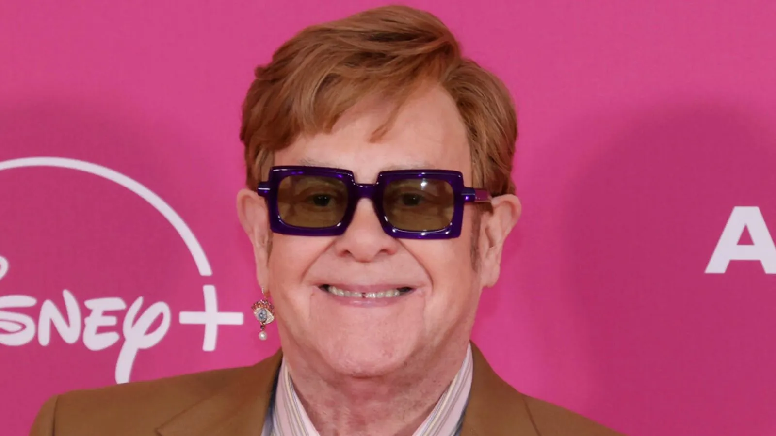 100+ Elton John Lyrics for Timeless Social Media Posts--