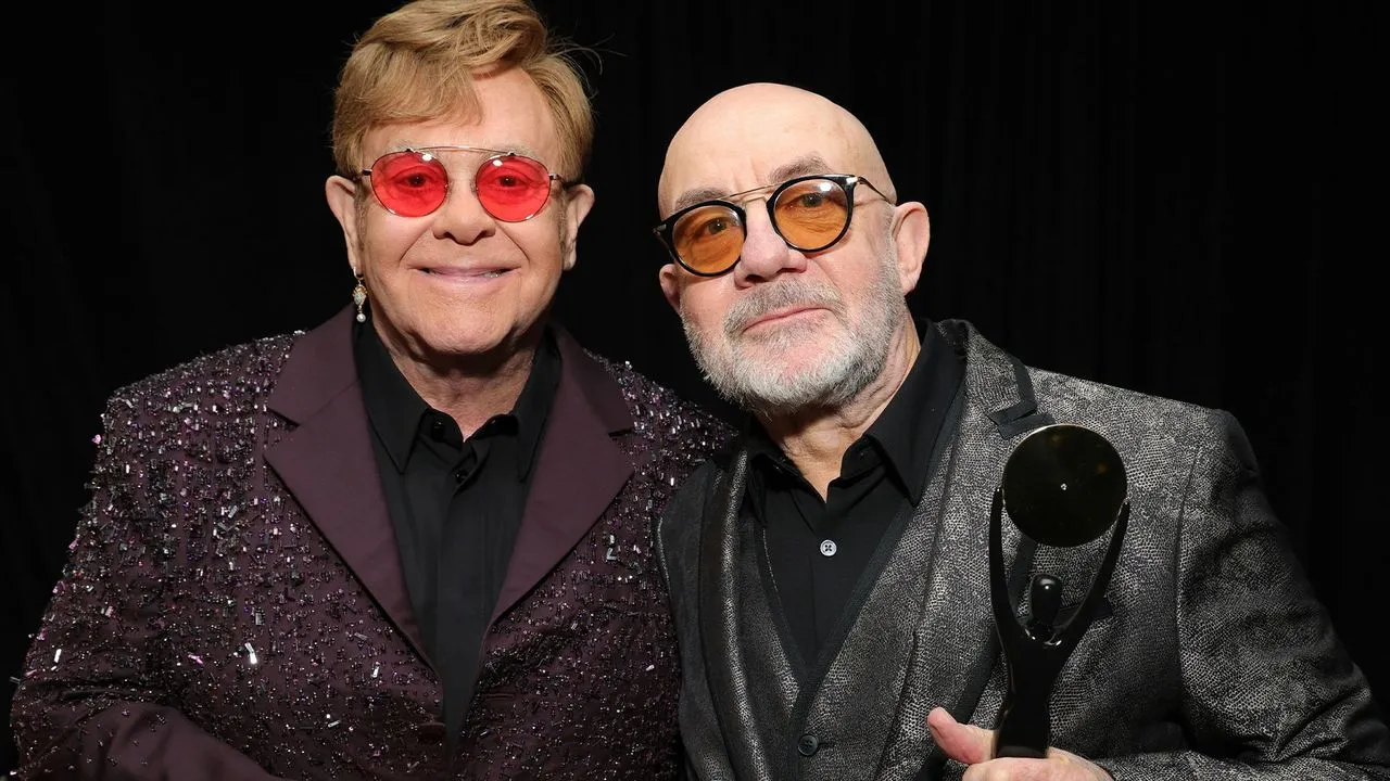 100+ Elton John Lyrics for Timeless Social Media Posts--------