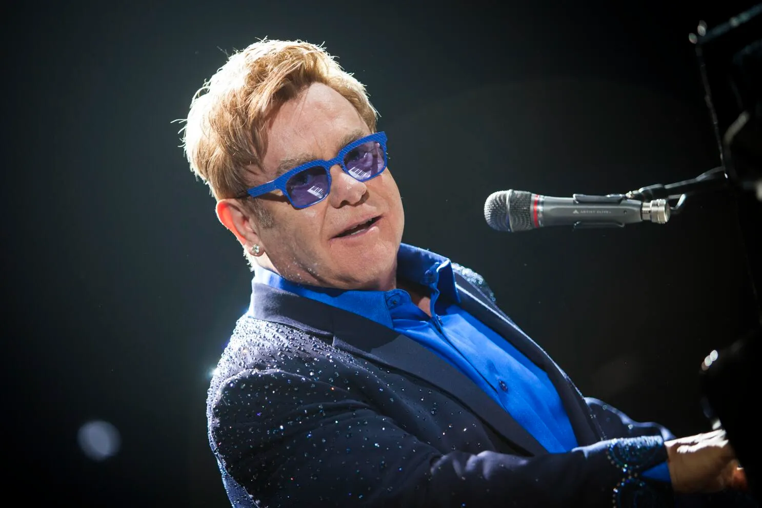 100+ Elton John Lyrics for Timeless Social Media Posts