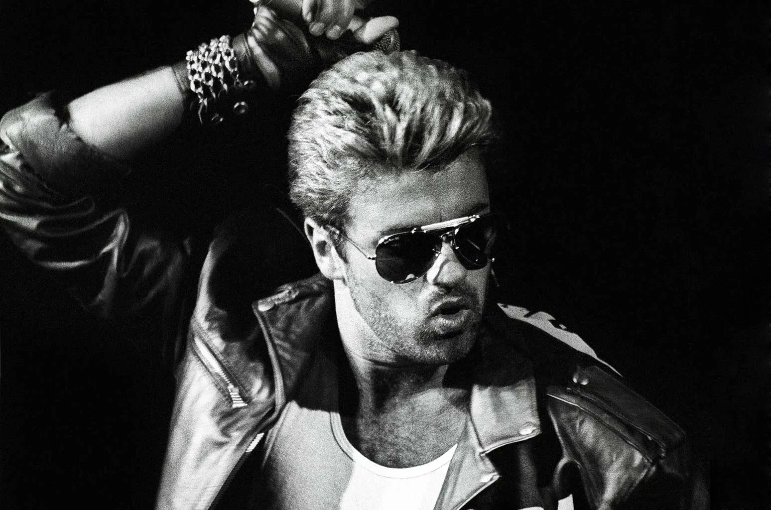 120+ George Michael Lyrics for Soulful Captions--